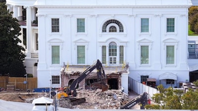 An excavator works to clear rubble after the East Wing of the White House was demolished in Washington, DC. The demolition is part of US President Donald Trump's plan to build a multimillion-dollar ballroom on the eastern side of the White House. AFP