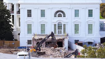 An excavator works to clear rubble after the East Wing of the White House was demolished in Washington, DC. The demolition is part of US President Donald Trump's plan to build a multimillion-dollar ballroom on the eastern side of the White House. AFP