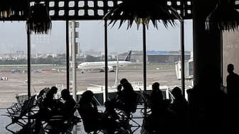 People wait to board their flight at the Chhatrapati Shivaji Maharaj International Airport in Mumbai, May 30, 2025. File Photo/Reuters