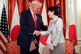 US President Donald Trump shakes hands with Japanese Prime Minister Sanae Takaichi during a bilateral meeting at Akasaka Palace in Tokyo, Japan. Reuters
