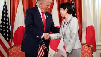 US President Donald Trump shakes hands with Japanese Prime Minister Sanae Takaichi during a bilateral meeting at Akasaka Palace in Tokyo, Japan. Reuters