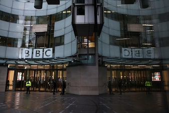 People stand outside BBC Broadcasting House after Director General of BBC Tim Davie and Chief Executive of BBC News Deborah Turness resigned following accusations of bias at the British broadcaster, including in the way it edited a speech by US President Donald Trump, in London, Britain, November 10, 2025. REUTERS/Jack Taylor TPX IMAGES OF THE DAY
