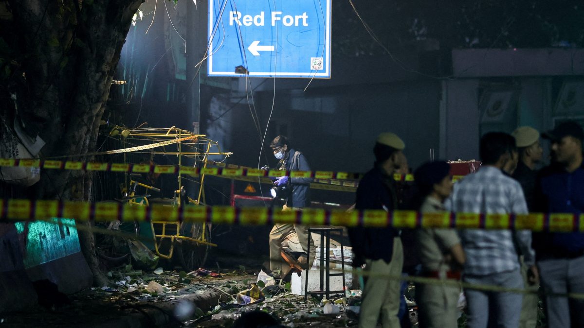 A sign reading "Red Fort" as emergency personnel work at the site of an explosion in the old quarters of Delhi. Reuters A sign reading "Red Fort" as emergency personnel work at the site of an explosion in the old quarters of Delhi. Reuters