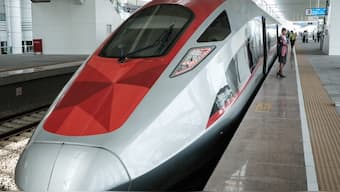 The Jakarta-Bandung high-speed train named Whoosh is seen on a platform at the Tegalluar station in Bandung, West Java, on May 4, 2024. (Photo by Yasuyoshi CHIBA / AFP)