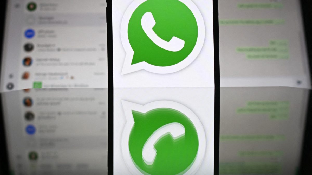 An illustration photograph taken on April 17, 2025 shows Whatsapp web displayed on a laptop screen with a phone displaying the Whatsapp logo, in a residential property in Guildford, south of London. (Photo by Justin TALLIS / AFP) An illustration photograph taken on April 17, 2025 shows Whatsapp web displayed on a laptop screen with a phone displaying the Whatsapp logo, in a residential property in Guildford, south of London. (Photo by Justin TALLIS / AFP)