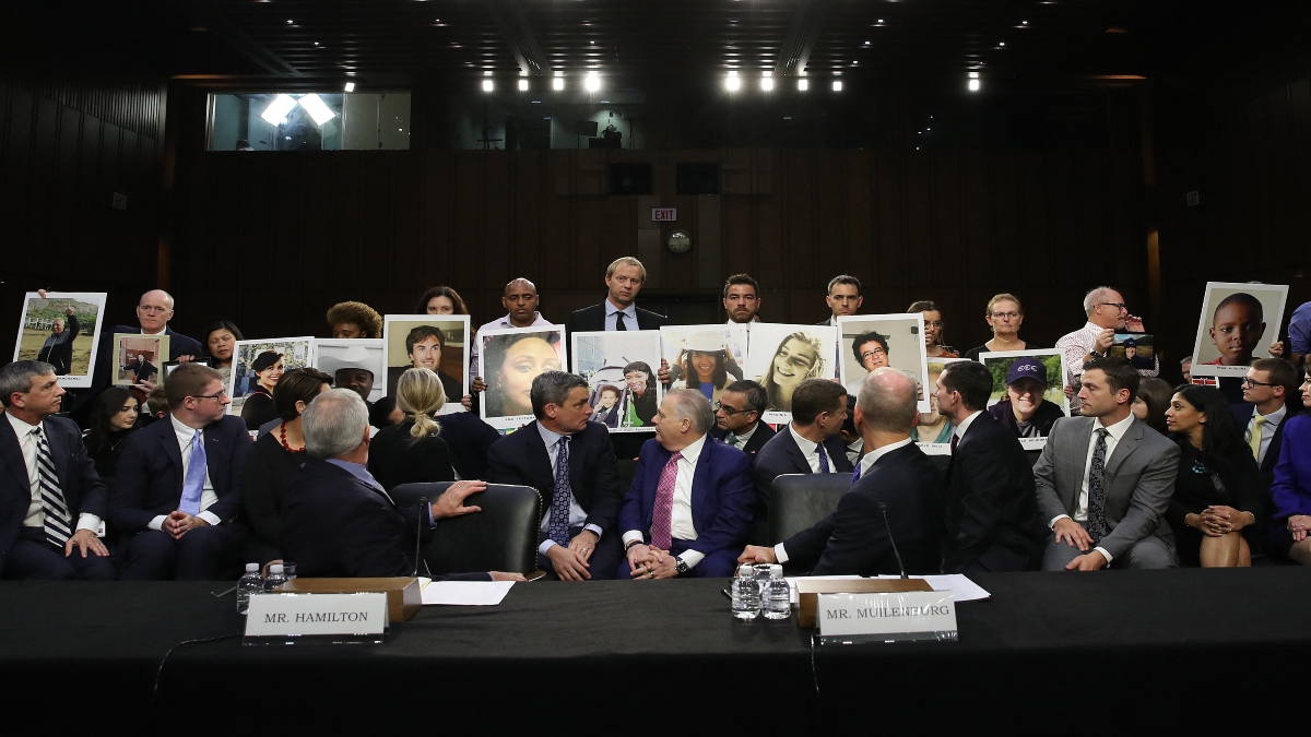 Family members of those who died aboard Ethiopian Airlines Flight 302 hold photographs of their loved ones as Dennis Muilenburg (R), President and CEO of the Boeing Company, and John Hamilton (L), Vice President and Chief Engineer of Boeing Commercial Airplanes, testify before the Senate Commerce Committee October 29, 2019 in Washington, DC. AFP Family members of those who died aboard Ethiopian Airlines Flight 302 hold photographs of their loved ones as Dennis Muilenburg (R), President and CEO of the Boeing Company, and John Hamilton (L), Vice President and Chief Engineer of Boeing Commercial Airplanes, testify before the Senate Commerce Committee October 29, 2019 in Washington, DC. AFP