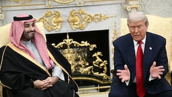 US President Donald Trump meets with Crown Prince and Prime Minister of the Kingdom of Saudi Arabia Mohammed bin Salman in the Oval Office of the White House in Washington, DC on November 18, 2025. AFP