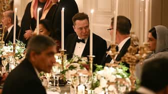 CEO of SpaceX and Tesla, South African-Canadian-US businessman Elon Musk, attends an official dinner with US President Donald Trump and Crown Prince and Prime Minister of the Kingdom of Saudi Arabia Mohammed bin Salman in the East Room of the White House in Washington, DC on November 18, 2025. (Photo by Brendan SMIALOWSKI / AFP)