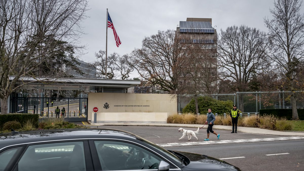 A man jogs with his dog outside the Missions of the United States of America in Geneva, on November 23, 2025 ahead of discussions on a US plan to end the war in Ukraine. US Secretary of State Marco Rubio arrived in Geneva on November 23, 2025 morning for discussions on a US plan to end the Ukraine war, after Washington signalled room for negotiation on the controversial proposal. Ukrainian, European and Canadian officials were also gathering in the Swiss city. (Photo by Fabrice COFFRINI / AFP) A man jogs with his dog outside the Missions of the United States of America in Geneva, on November 23, 2025 ahead of discussions on a US plan to end the war in Ukraine. US Secretary of State Marco Rubio arrived in Geneva on November 23, 2025 morning for discussions on a US plan to end the Ukraine war, after Washington signalled room for negotiation on the controversial proposal. Ukrainian, European and Canadian officials were also gathering in the Swiss city. (Photo by Fabrice COFFRINI / AFP)