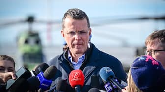 Romanian Minister of Defence Ionut Mosteanu addresses the media at Mihail Kogalniceanu Air Base on November 25, 2025. Mosteanu resigned on November 28, 2025 following accusations of having lied about his university studies in a CV. "Today, I resigned from my position as Minister of National Defence," Mosteanu announced in a Facebook post. "Romania and Europe are under attack from Russia. Our national security must be defended at all costs," he added, saying he does not want the discussions about his background "to distract those who are now leading the country from their difficult mission". (Photo by Daniel MIHAILESCU / AFP)