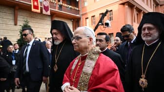 Pope Leo XIV arrives to take part in a Divine Liturgy at Patriarchal Church of Saint George, in Istanbul on November 30, 2025. (Photo by Ozan KOSE / AFP)