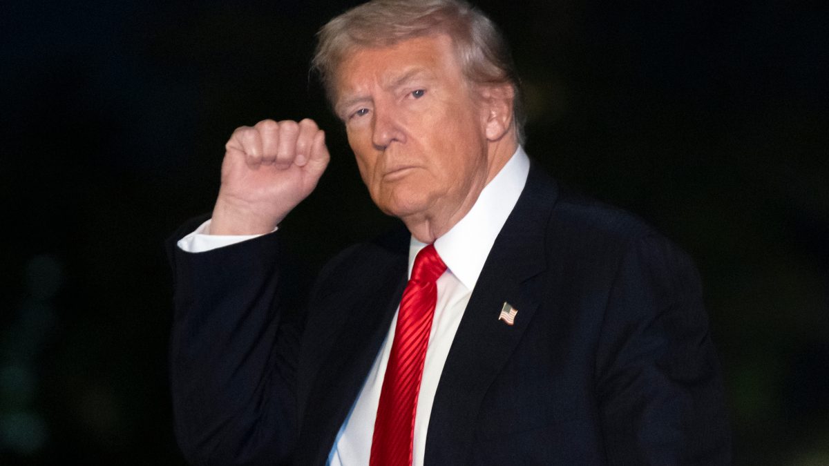 President Donald Trump gestures while walking across the South Lawn of the White House. File image/AP President Donald Trump gestures while walking across the South Lawn of the White House. File image/AP