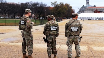 National Guard patrol on the National Mall near the US Capitol in Washington. AP