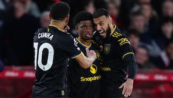 Manchester United's Amad Diallo celebrates with teammates after scoring the equaliser for his team in the 81st minute of their Premier League away game against Nottingham Forest. AP