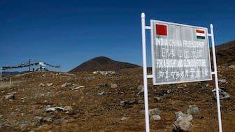 A signboard is seen from the Indian side of the Indo-China border at Bumla, in the northeastern Indian state of Arunachal Pradesh, November 11, 2009. File Image/Reuters