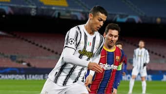 Cristiano Ronaldo and Lionel Messi fight for the ball during the UEFA Champions League showdown between Juventus and Barcelona in December 2020. Reuters