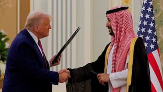 US President Donald Trump and Saudi Crown Prince and Prime Minister Mohammed bin Salman shake hands during a Memorandum of Understanding (MOU) signing ceremony at the Royal Court in Riyadh, Saudi Arabia, on May 13, 2025. (Photo: Brian Snyder/Reuters) 
