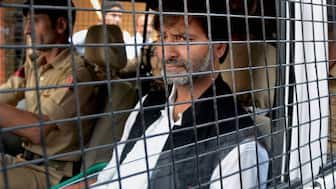Kashmiri separatist leader Yasin Malik, the head of Jammu and Kashmir Liberation Front (JKLF), being taken away after arrested by police in Srinagar, J&K. (Photo: S Irfan/PTI) 