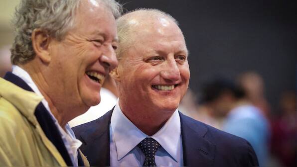 general Berkshire Vice Chairman Greg Abel (right) poses with a shareholder during the Berkshire Hathaway Inc. annual shareholders' meeting, in Omaha, Nebraska, US, May 2, 2025. File Image/Reuters