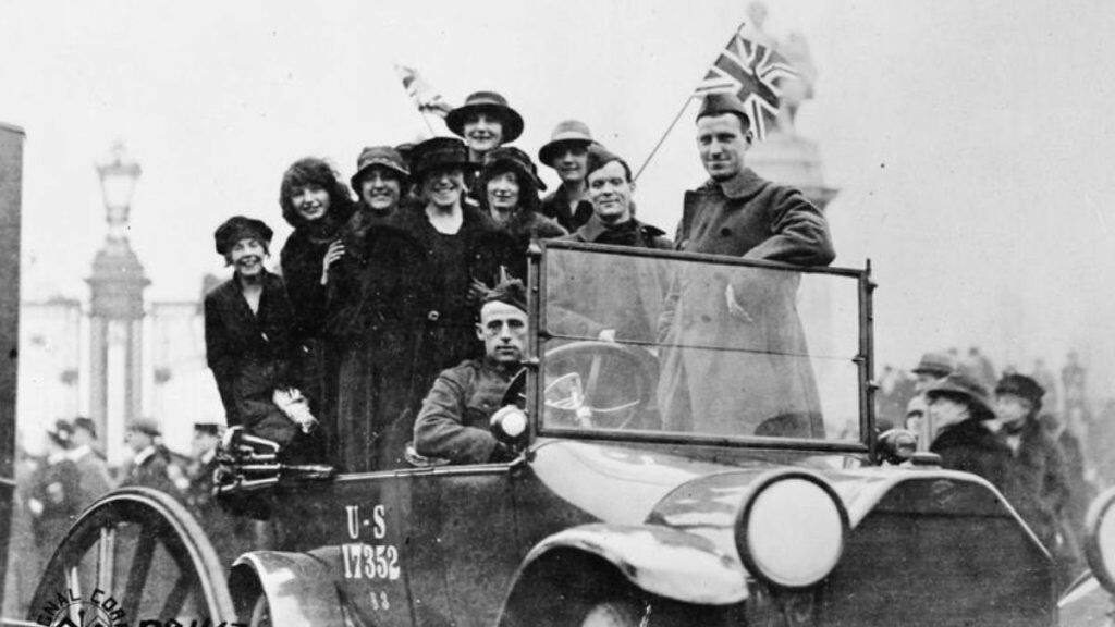 A happy crowd in a US automobile on the day the Armistice was signed on 11 November 1918. Wikimedia Commons