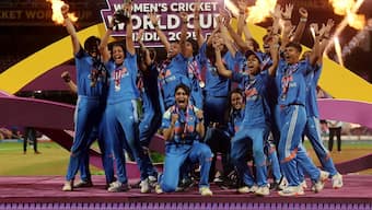 Team India celebrate with the trophy after being crowned champions of the 2025 ICC Women's World Cup at the DY Patil Stadium in Navi Mumbai. Reuters