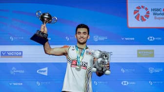 India's Lakshya Sen poses with the winner's trophy after winning the 2025 Australian Open Super 300 in Sydney. Image credit: Badminton Photo