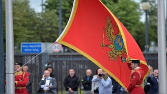 Flag of Montenegro is raised during a ceremony to mark the accession to Nato of Montenegro at Nato headquarters in Brussels, Belgium, on June 7, 2017. Reuters File