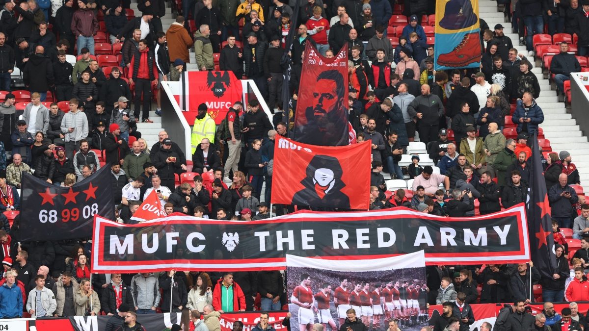 Manchester United fans inside the stadium before a match. Reuters Manchester United fans inside the stadium before a match. Reuters