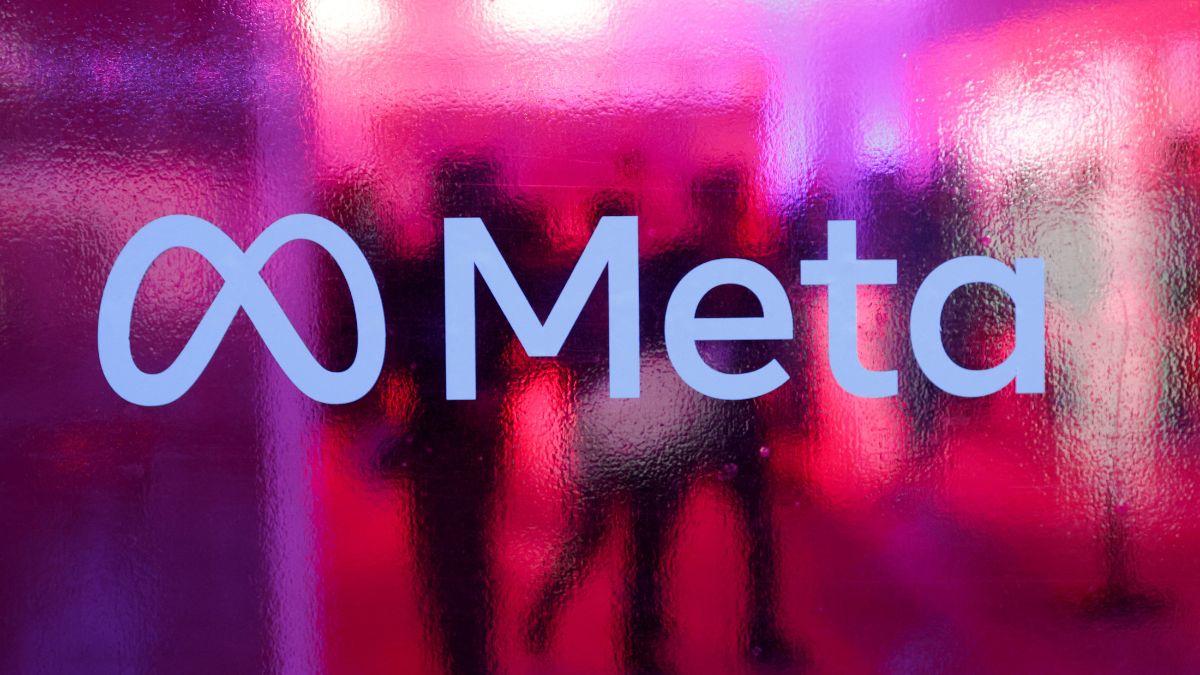 People walk behind a logo of Meta Platforms company, during a conference in Mumbai, India, September 20, 2023. Representational Image/Reuters People walk behind a logo of Meta Platforms company, during a conference in Mumbai, India, September 20, 2023. Representational Image/Reuters