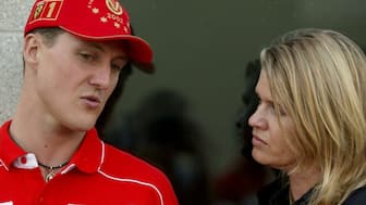 File photo of F1 legend Michael Schumacher and his wife Corrina. Reuters