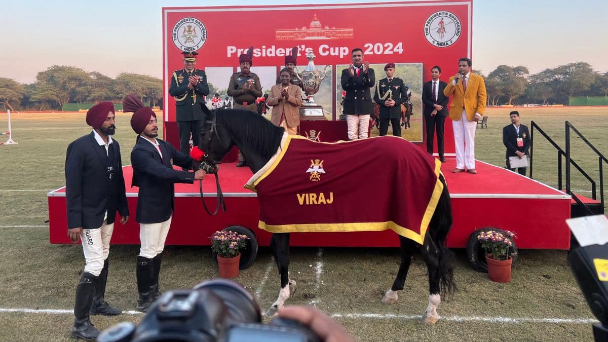 An honorary caparison is awarded to PBG horse, Viraj, by President Droupadi Murmu at the President’s Polo Cup held at the President’s Bodyguard Parade Ground in New Delhi, December 14, 2024. Viraj’s honour is a first of its kind, being one of the only horses skilled at polo as well as racing and other equestrian skills. Firstpost/Anmol Singla