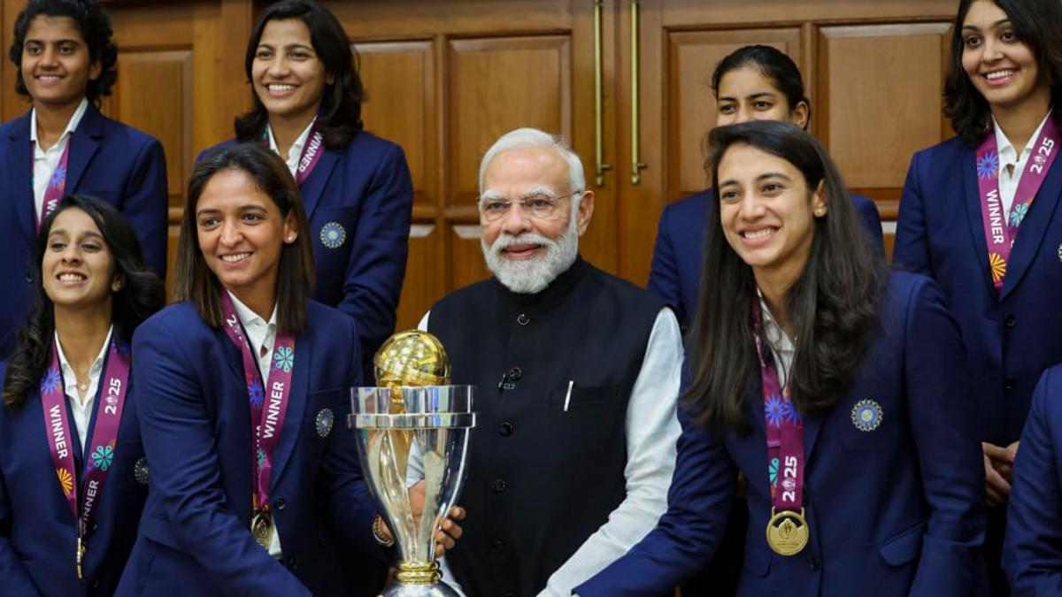 Prime Minister Narendra Modi poses with the ICC Women's World Cup trophy along with members of the India women's cricket team in New Delhi. PTI Prime Minister Narendra Modi poses with the ICC Women's World Cup trophy along with members of the India women's cricket team in New Delhi. PTI
