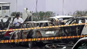  Charred remains of vehicles amid a cordoned off area following a blast that occurred near Red Fort Metro Station on Monday, killing at least nine people and gutting several vehicles, in New Delhi, Tuesday, Nov. 11, 2025. PTI
