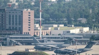 FILE -United States' Air Force transport aircrafts are seen on the tarmac at Ramstein US air base, in Landstuhl, Germany, June 23, 2025. (Boris Roessler/dpa via AP, File)

