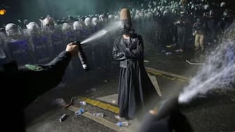 Riot police officers use pepper spray to clear a protester during a protest after Istanbul's Mayor Ekrem Imamoglu was arrested and sent to prison, in Istanbul, Turkey, March 23, 2025. File Image/AP


