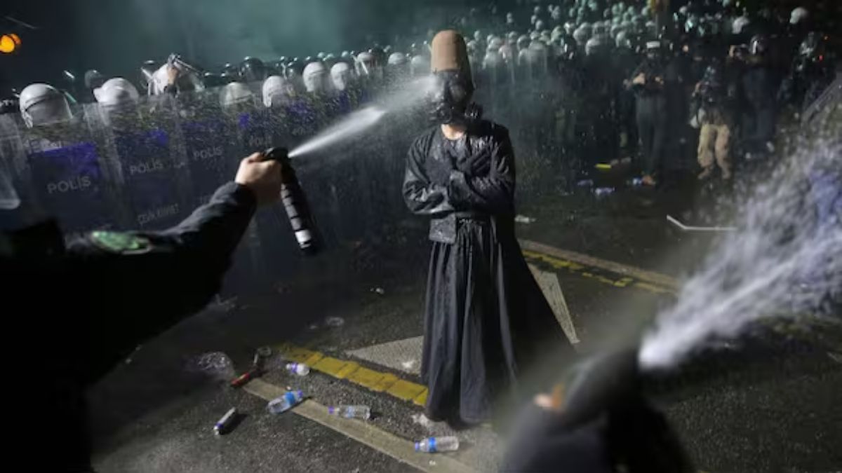 Riot police officers use pepper spray to clear a protester during a protest after Istanbul's Mayor Ekrem Imamoglu was arrested and sent to prison, in Istanbul, Turkey, March 23, 2025. File Image/AP
Riot police officers use pepper spray to clear a protester during a protest after Istanbul's Mayor Ekrem Imamoglu was arrested and sent to prison, in Istanbul, Turkey, March 23, 2025. File Image/AP