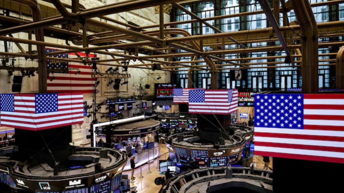 American flags are displayed on screens on the floor at the New York Stock Exchange (NYSE) in New York City, U.S., September 22, 2025. REUTERS American flags are displayed on screens on the floor at the New York Stock Exchange (NYSE) in New York City, U.S., September 22, 2025. REUTERS