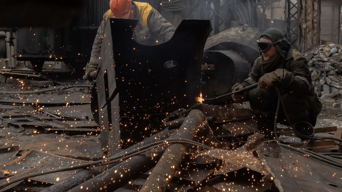 Employees work next to scorched equipment at a power plant of Ukrainian energy provider DTEK, which was damaged by constant Russian air attacks, at an undisclosed location on November 13, 2025, amid the Russian invasion of Ukraine.- AFP Employees work next to scorched equipment at a power plant of Ukrainian energy provider DTEK, which was damaged by constant Russian air attacks, at an undisclosed location on November 13, 2025, amid the Russian invasion of Ukraine.- AFP