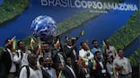 Protests, threats and a ‘clown show’: Fractious Cop30 ends with fragile climate deal as US absence looms