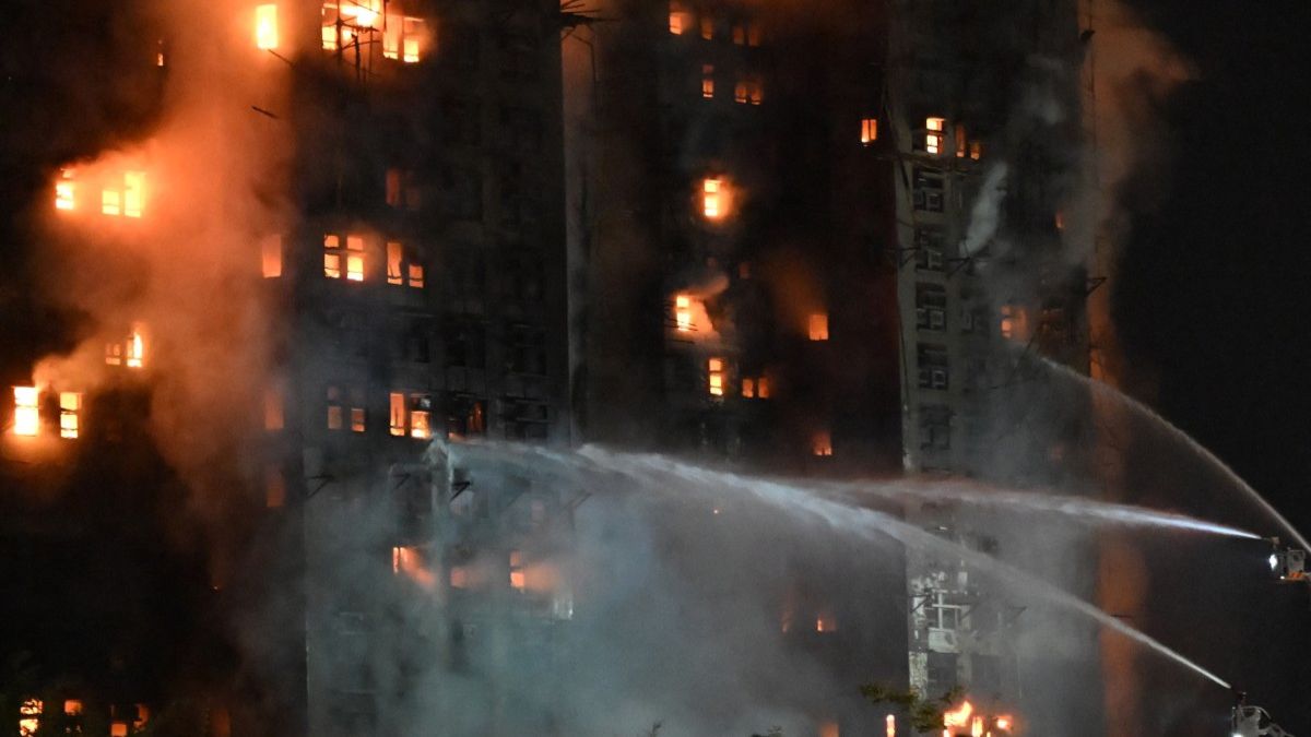 Firefighters spray water during a major fire at the Wang Fuk Court residential estate in Hong Kong's Tai Po district on November 26, 2025.
Image- AFP Firefighters spray water during a major fire at the Wang Fuk Court residential estate in Hong Kong's Tai Po district on November 26, 2025.
Image- AFP