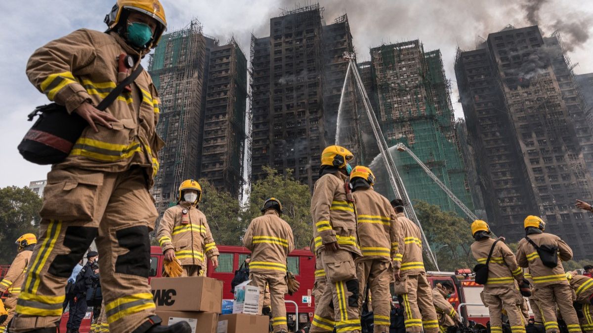 Firemen get ready after a major fire swept through several apartment blocks at the Wang Fuk Court residential estate in Hong Kong's Tai Po district on November 27, 2025. Image- AFP Firemen get ready after a major fire swept through several apartment blocks at the Wang Fuk Court residential estate in Hong Kong's Tai Po district on November 27, 2025. Image- AFP