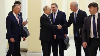 Russian President Vladimir Putin, centre, shakes hands with his envoy Kirill Dmitriev as US President Donald Trump's special envoy Steve Witkoff, left, looks on, before talks in St Petersburg, Russia, on April 11, 2025. File Image/Sputnik via AP