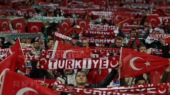 Turkey fans are pictured with flags and banners. Reuters