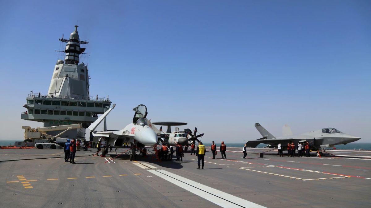 The electromagnetic catapult-assisted takeoff and arrested landing training on the aircraft carrier during a maiden sea trial.(Image: AP) The electromagnetic catapult-assisted takeoff and arrested landing training on the aircraft carrier during a maiden sea trial.(Image: AP)