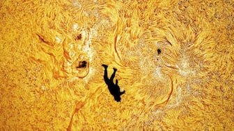 Shot Of Man Skydiving Through Sun (Photo: X/Andrew McCarthy)