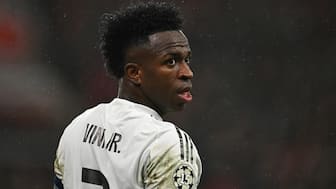 Real Madrid's Brazilian forward #07 Vinicius Junior looks on during the UEFA Champions League match. AFP