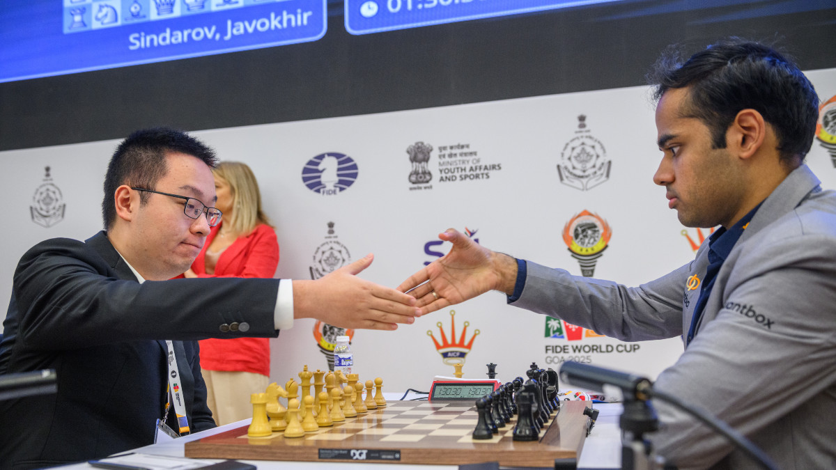 China's Wei Yi and India's Arjun Erigaisi shake hands after playing out a draw in Game 1 of their quarter-final meeting at the FIDE World Cup in Goa. Image credit: FIDE/Michal Walusza China's Wei Yi and India's Arjun Erigaisi shake hands after playing out a draw in Game 1 of their quarter-final meeting at the FIDE World Cup in Goa. Image credit: FIDE/Michal Walusza