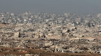 This picture taken from a position at Israel's border with the Gaza Strip shows destroyed buildings in the besieged Palestinian territory on October 30, 2025. (AFP)