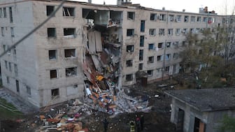 Ukrainian rescuers work at the site of a heavily damaged building following an air attack in Zaporizhzhia on October 30, 2025, amid the Russian invasion of Ukraine. (AFP file)