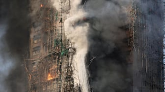 Flames swept through bamboo scaffolding spanning several buildings at the Wang Fuk Court housing estate in Tai Po, Hong Kong, on November 26. (Reuters)